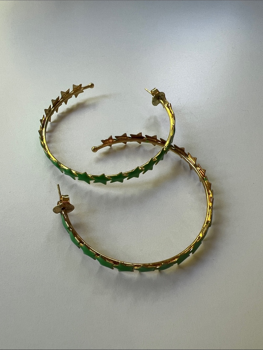 Sheila Fajl 2 inch Gold Hoop Earrings with Green Star Accents